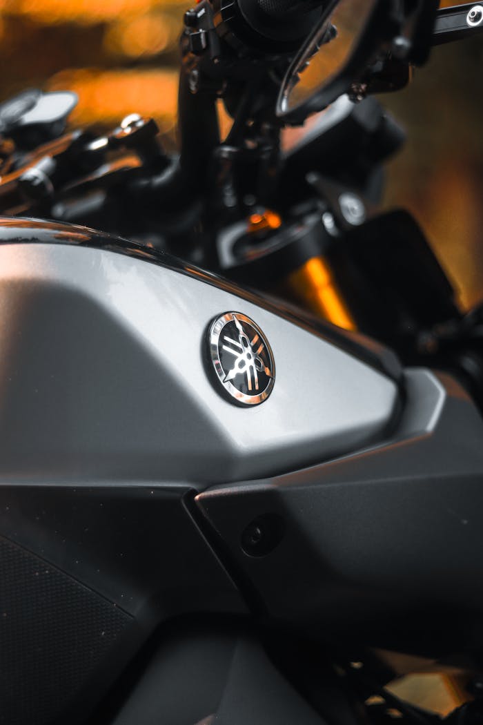 Close-up shot of a matte Yamaha motorcycle showcasing sleek design and branding.